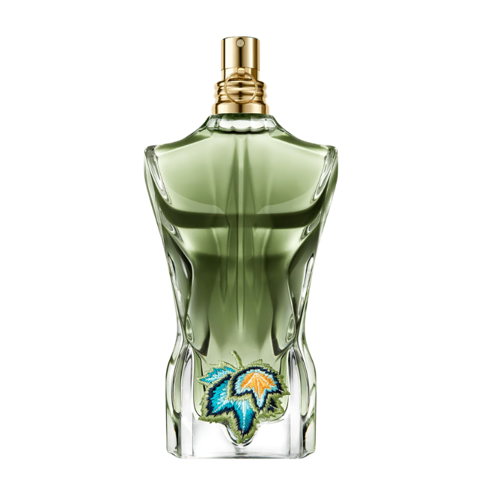 Green perfume bottle with floral design on a white background